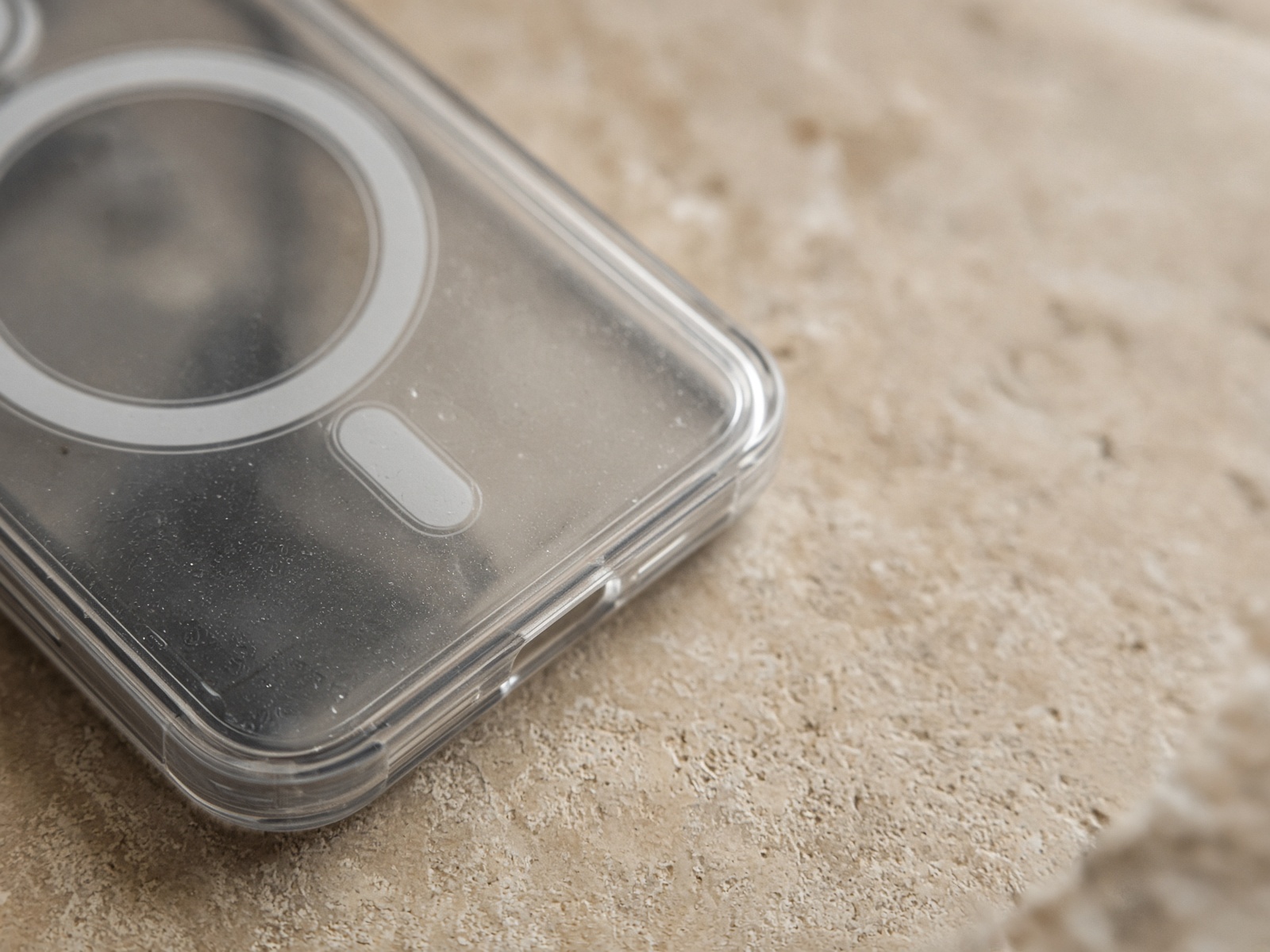 A MagSafe charger snapped to a Scrollcore case
